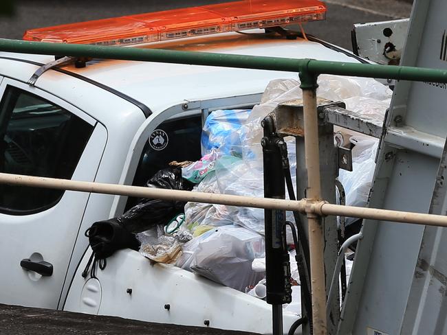 A ute leaves the scene of the chemical spill. Picture: Toby Zerna