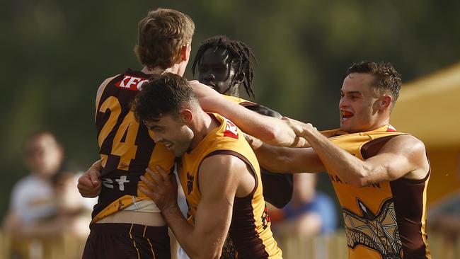 Players wrestle after a marking contest between Connor Macdonald and Denver Grainger-Barras during the Hawks intra-club match at La Trobe University. Picture: Getty Images