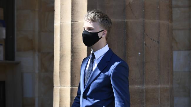 Operation Ironside defendant Apostle Broikos, 19, outside the Adelaide Magistrates Court where his matters were adjourned. Picture: Naomi Jellicoe