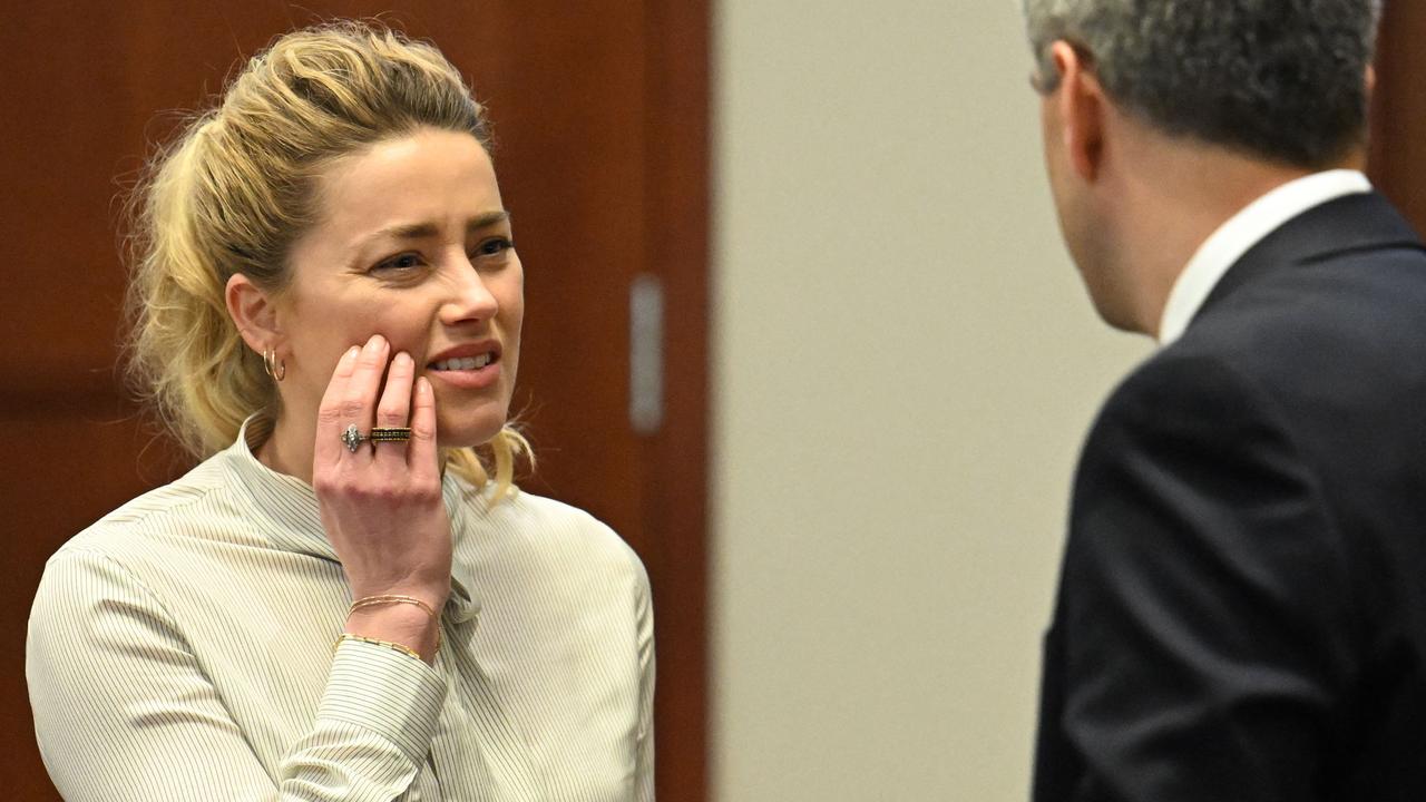 Passions are high for Amber Heard at the Virginia courthouse. Photo: Jim Watson/AFP