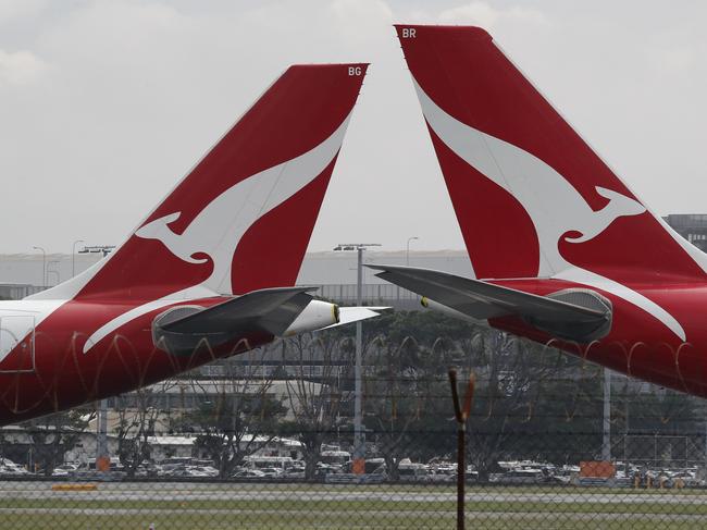 SYDNEY, AUSTRALIA - NewsWire Photos February 25, 2021: QANTAS has reported losses of around 1 billion dollars over the last year, counting the financial cost of Covid-19 on the airline. QANTAS planes are pictured at Sydney Airport today. Picture: NCA NewsWire / David Swift