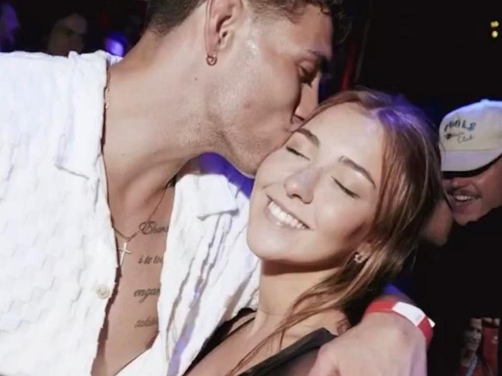 Liam Hampson in the background of a picture taken at a Barcelona nightclub where his body would be found hours later. His mate, Jordan Riki, is in the foreground with a woman.