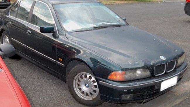 The green 1997 BMW sedan owned by Jeanette Moss.