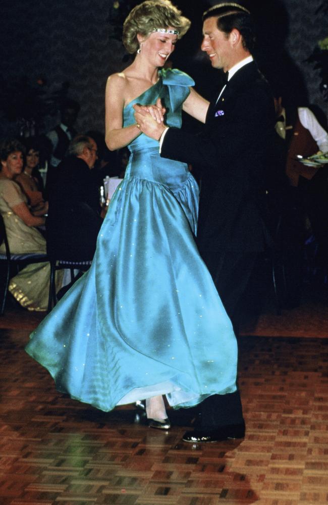 Princess Diana was the belle of the ball during a twirl around the dancefloor with her husband in 1985. Picture: Getty Images