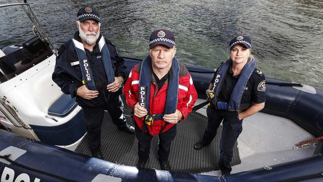 Memebsr from the Tasmanian Police Marine and Rescue Services Senior Constable Michael Barber, Sergeant Damian Bidgood and Senior Constable Karina Lane as they conducted Rock Lobster season patrols. Picture: Zak Simmonds