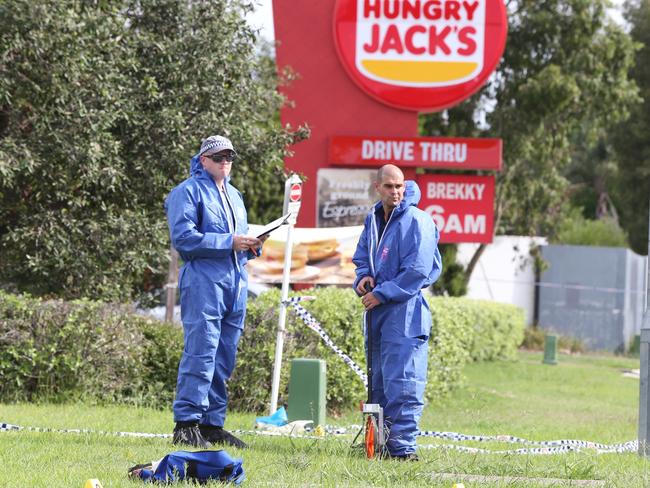 Forensic services at the scene. Picture Craig Greenhill