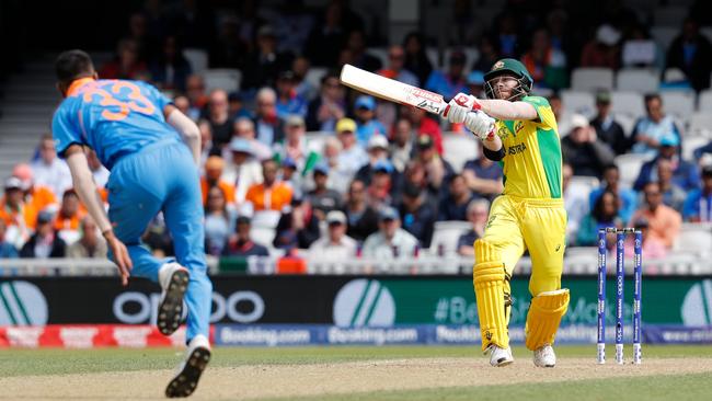 Australia's David Warner plays a rare attacking shot against India at The Oval