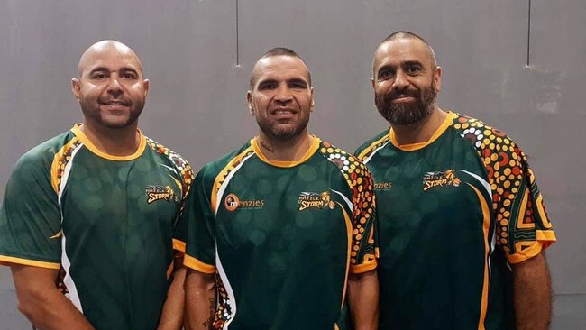 Razzle coach Timmy Duggan with assistants Anthony Mundine and Lindsay Munro at the Australian Indigenous Basketball Tournament in Cairns last month.