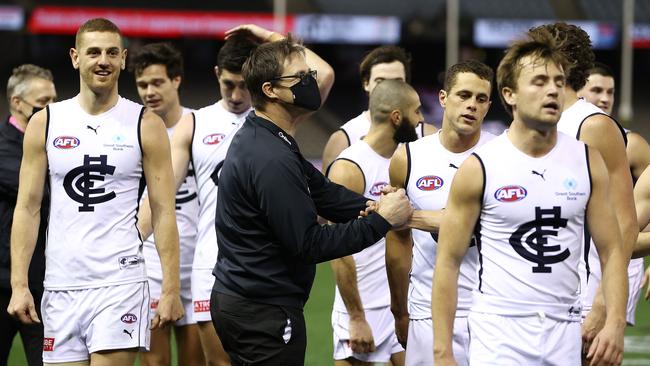 David Teague, senior coach of Carlton with players after the team’s win over St Kilda. Picture: Michael Klein