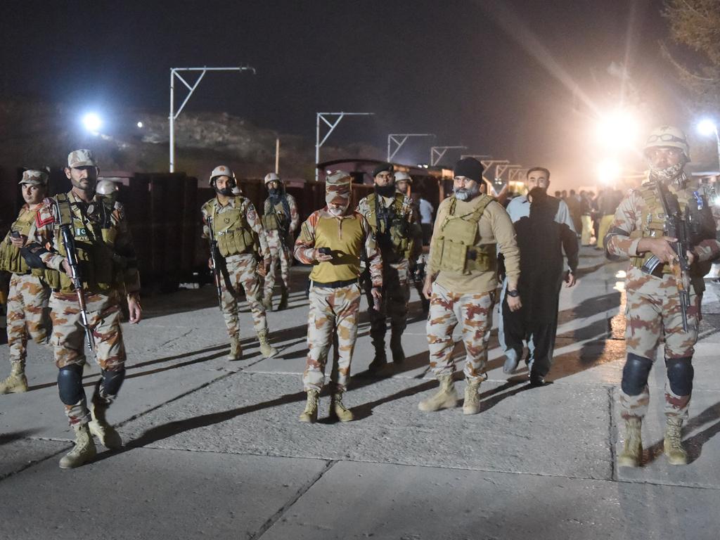 Soldiers secure Mach railway station after Pakistani security forces freed some passengers following a security operation against armed militants. Picture: AFP