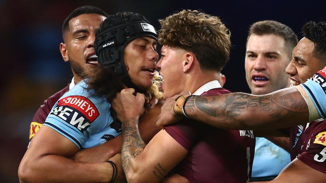 Jarome Luai and Reece Walsh clash before both being sent off in Origin II at Suncorp Stadium. Picture: Chris Hyde/Getty Images