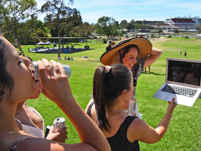 Picknicking in a park overlooking Flemington. Picture: William West