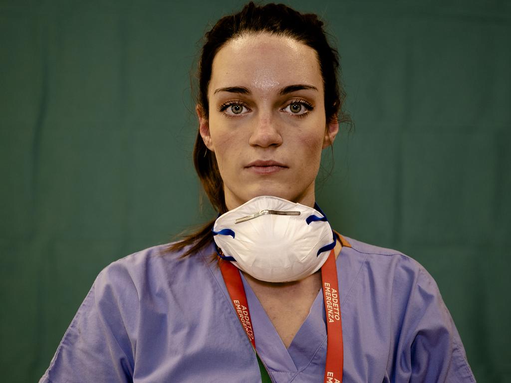 Masks are of most use to medical professionals, like Martina Papponetti, 25, a nurse at the Humanitas Gavazzeni Hospital in Bergamo, Italy. Picture: AP Photo/Antonio Calanni