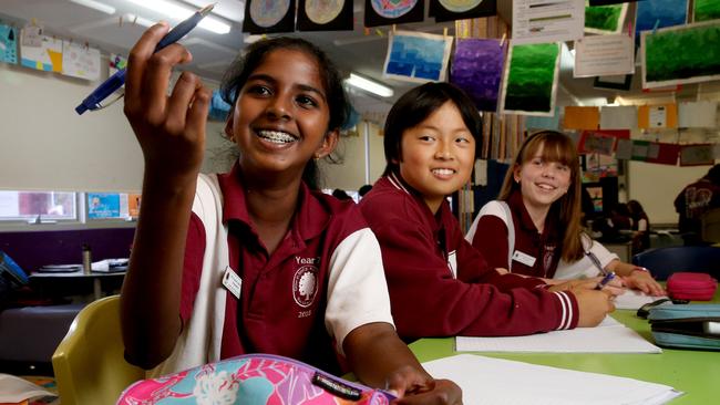 08/04/16 Linden Park Primary students Alokha Sureiander, Kyogo Sakai and Elise Martin at their school. Linden Park Primary is a top performing public school in NAPLAN tests. photo Calum Robertson