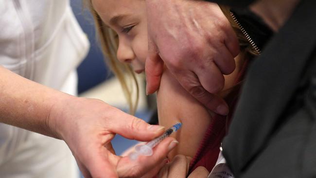 A child in Israel receives a dose of the Pfizer vaccine. Picture: Gil Cohen-Magen/AFP