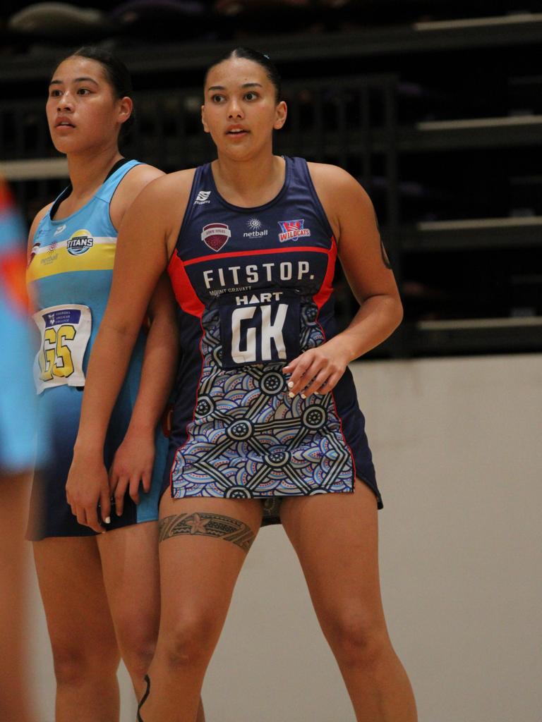 Gold Coast Titans v Brisbane South Wildcats U18 Nissan State Titles. Pictured: Siana Matavalea (navy) and Roxy Rhind (blue)