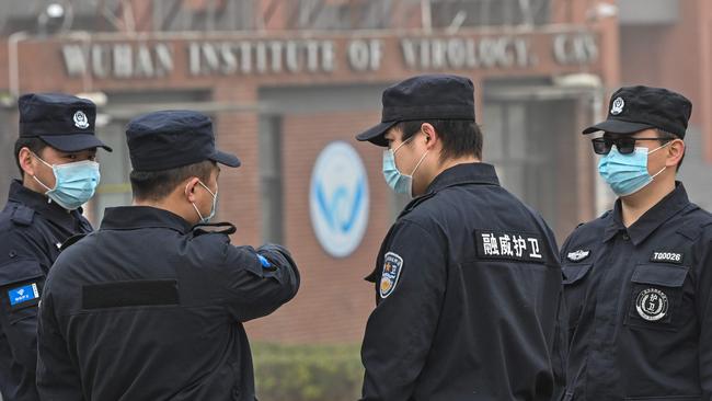 Security personnel stand guard outside the Wuhan Institute of Virology in Wuhan as members of the WHO investigation team traces the origins of Covid. Picture: AFP