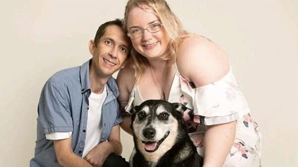 Josh and Sarah Wilson with one of their beloved dogs. Picture – Facebook/Josh Wilson.