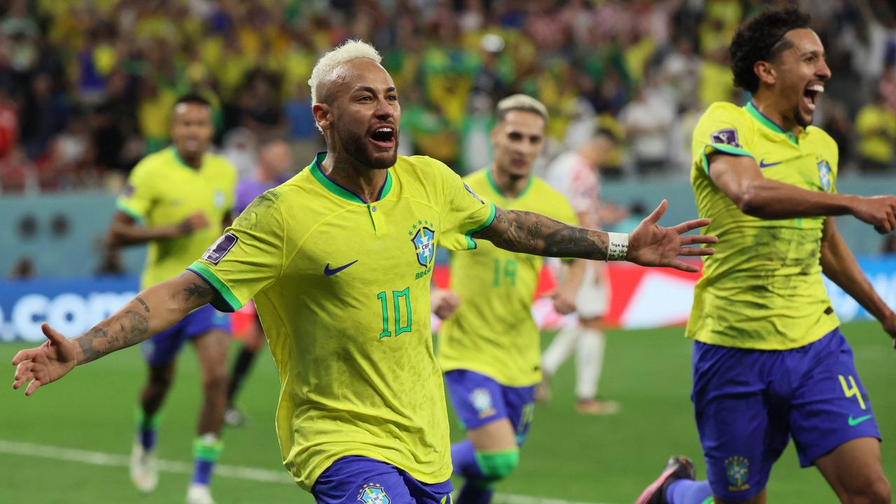 Neymar was all smiles after putting Brazil in front. (Photo by JACK GUEZ / AFP)