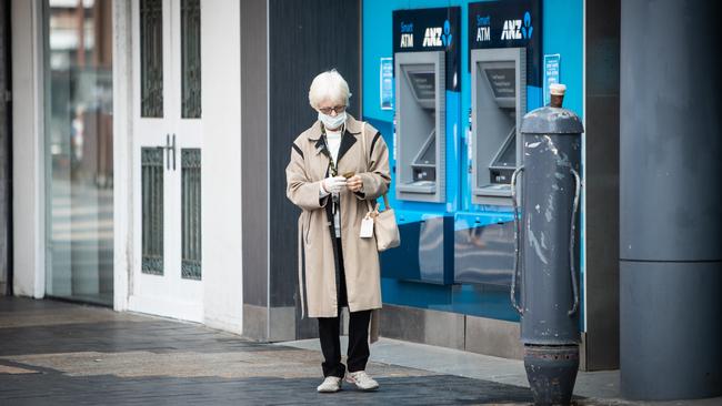 Masks and gloves are now not an unusual sight. Picture: Julian Andrews.