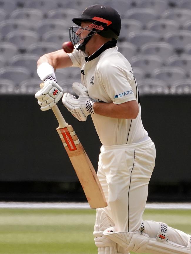 Shaun Marsh is struck in the head after the ball bounced up off the pitch.