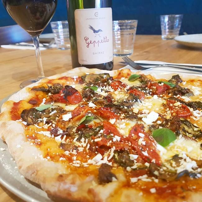 Vero Pasta and Wine restaurant's Ortolana Pizza — with roasted eggplant, zucchini, capsicum, olives, and ricotta salata is now available for takeaway. Photo: Facebook