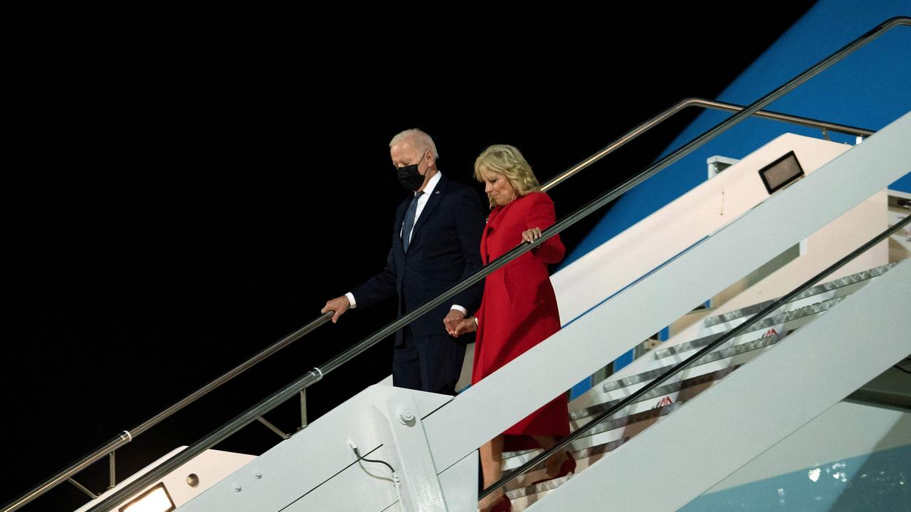 US President Joe Biden and US First Lady Jill Biden disembark from Air Force One upon arrival at Rome Fiumicino International Airport for the COP26 climate summit. Picture: Brendan Smialowski