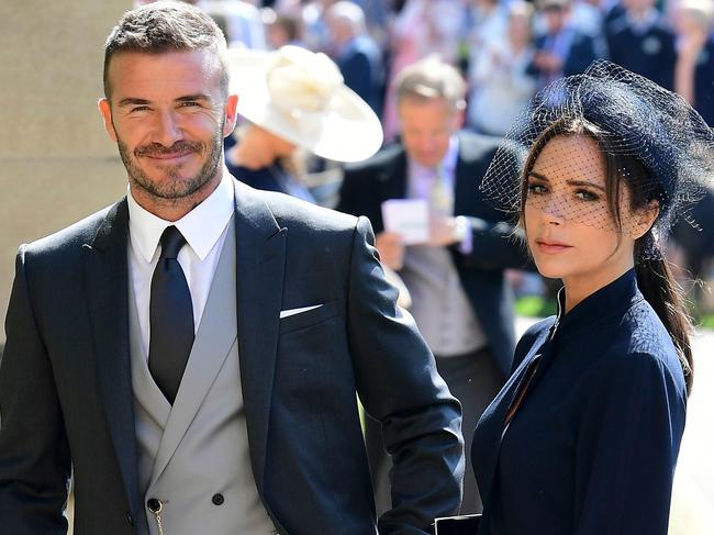 David Beckham, pictured with his wife Victoria, believes being careful with his alcohol consumption has helped his career. Picture: AFP/Ian West