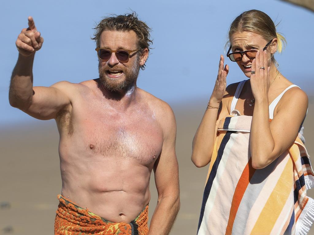 Simon Baker spends Easter weekend with mystery girlfriend at Byron Bay