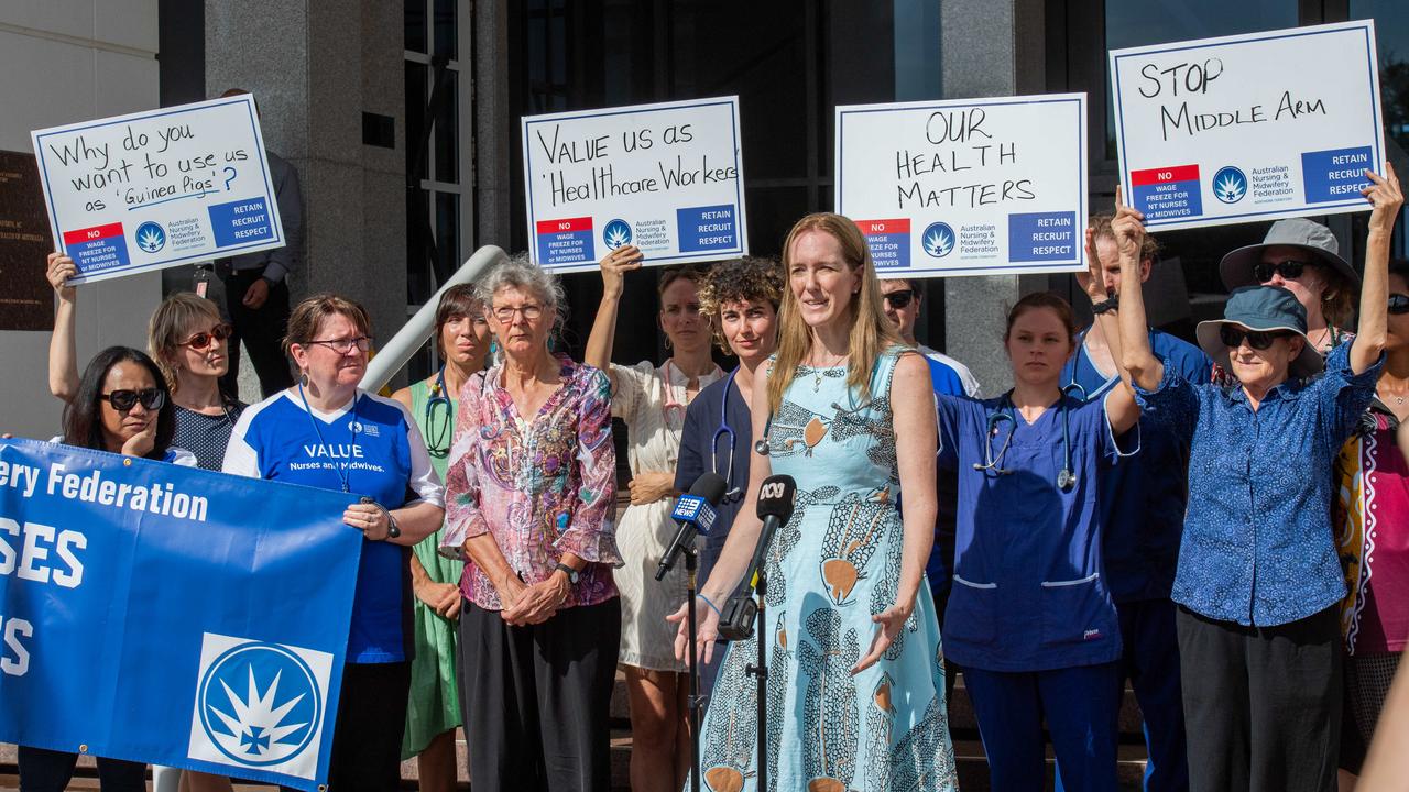 Northern Territory health workers protest the Middle Arm Industrial Precinct on the steps of Parliament House this week. Picture: Pema Tamang Pakhrin