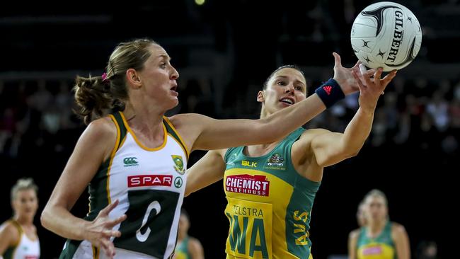 Erin Burger under pressure from Madi Robinson in the Quad series opener in Auckland.