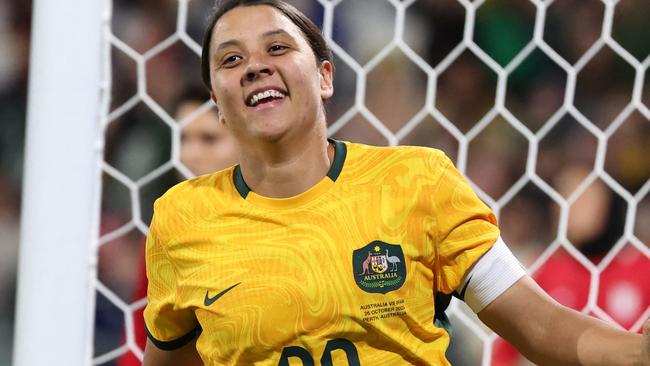 (FILES) Australia's Sam Kerr celebrates her goal during the Asian qualifying round women's football match between Australia and Iran for the Paris 2024 Olympic Games, at the Perth Rectangular  Stadium in Perth on October 26, 2023. Chelsea and Australian women's football star Sam Kerr has been charged with a "racially aggravated offence" following a dispute involving a police officer, London's Met Police said on March 4, 2024. "The charge relates to an incident involving a police officer who was responding to a complaint involving a taxi fare on 30 January 2023 in Twickenham," the statement said. (Photo by COLIN MURTY / AFP) / -- IMAGE RESTRICTED TO EDITORIAL USE - STRICTLY NO COMMERCIAL USE --