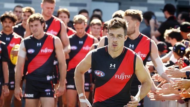 Zach Merrett leads the Bombers out in the practice match. Picture: Michael Klein