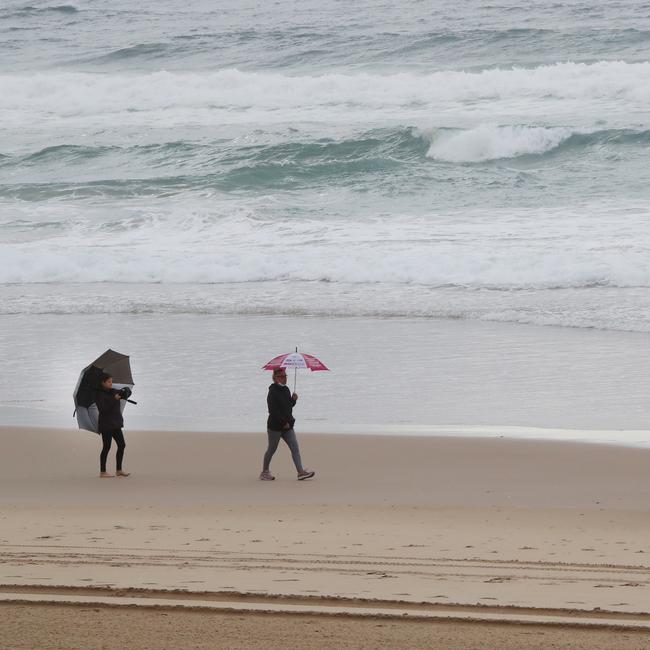 Day three of the Gold Coast lockdown.Follow the leader at Surfers Paradise. Picture Glenn Hampson