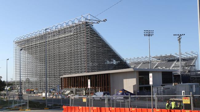 The Gold Coast Aquatic Centre's Commonwealth Games stadium in the process of being dismantled. Picture Mike Batterham