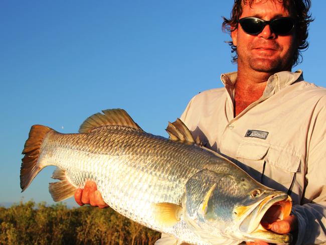 Corey Dysart with a 101cm chrome barra caught on a Classic F18 in the NT