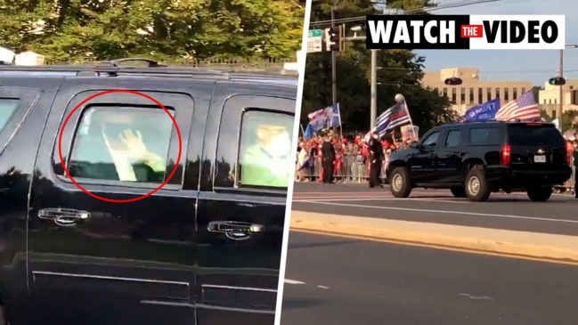 Trump waves to supporters outside hospital