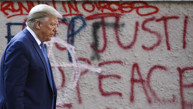 President Donald Trump walks from the White House through Lafayette Park to visit St. John's Church.