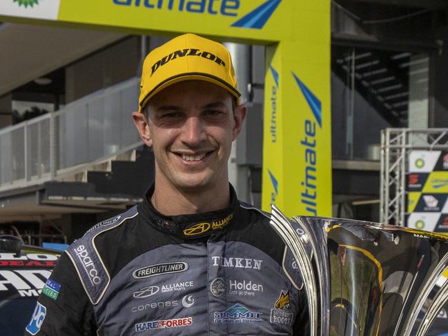 A supplied image shows Nick Percat posing for a photo after winning race 2 of the BP Ultimate Sydney SuperSprint, Event 3 of the Virgin Australia Supercars Championship in Sydney, Sunday, June 28, 2020. (AAP Image/Supplied by Edge Photographics, Mark Horsburgh) NO ARCHIVING, EDITORIAL USE ONLY