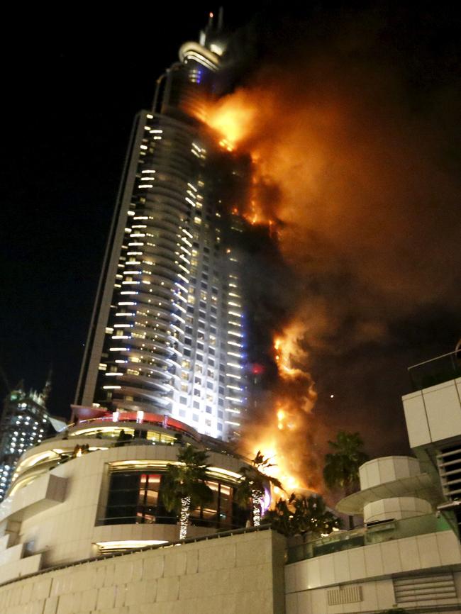 A fire engulfs The Address Hotel in downtown Dubai in the United Arab Emirates December 31, 2015. Flammable aluminium cladding has been blamed for rapidly spreading the blaze. Pic: Ahmed Jadallah