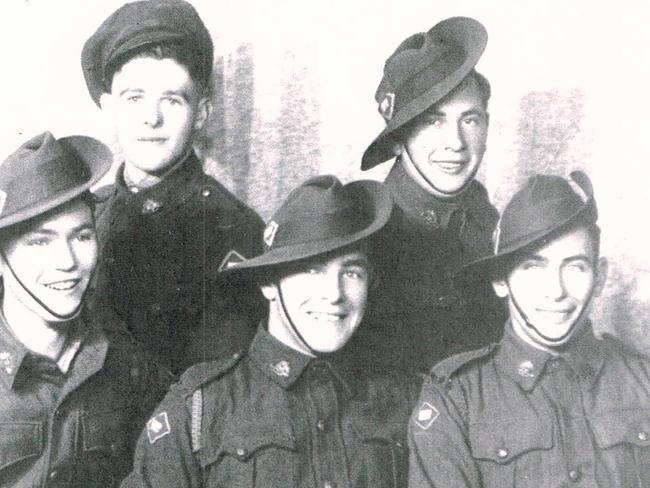 ‘The Moonee Ponds Gang’ ... Archie, back right, enlisted with his mates. They were all older than him, but still underage. He is believed to have been the only one to go to Sandakan.