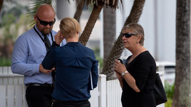 Bronwyn Buttery (right) speaking to David Munro, the Officer in Charge of the investigation into her son’s death, at the Darwin Local Court. Picture: Che Chorley