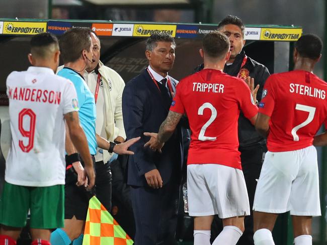 SOFIA, BULGARIA - OCTOBER 14: Raheem Sterling, Kieran Trippier and Jordan Henderson speak with Krasimir Balakov manager of Bulgaria during the UEFA Euro 2020 qualifier between Bulgaria and England on October 14, 2019 in Sofia, Bulgaria. (Photo by Catherine Ivill/Getty Images)