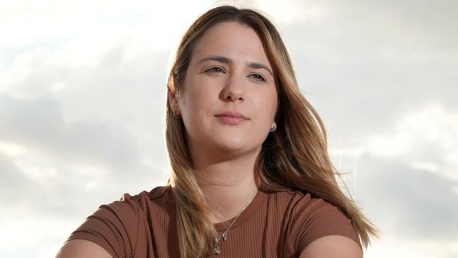 At Glenelg, Alannah Bercys,27, suffers from PMDD (premenstrual dysphoric disorder), experiencing symptoms such as extreme fatigue, exhaustion, anxiousness, paranoia, depression and brain fog. 28 March 2025. Picture: Dean Martin