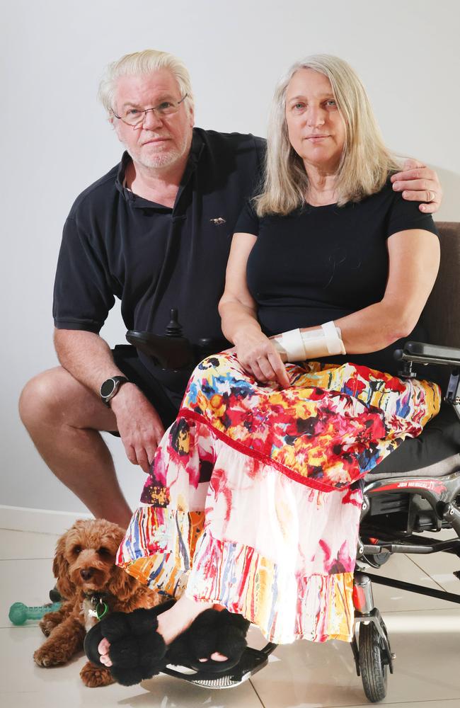 David and Elle at home on the Gold Coast with their dog Bailey. Picture: Glenn Hampson.