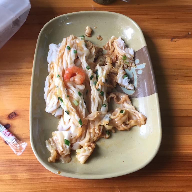 This dish, known as cheong fun, is a mix of thin rice noodles whipped up by a streetside vendor, filled with prawn, pork or eggs and doused with soy sauce and spring onions.