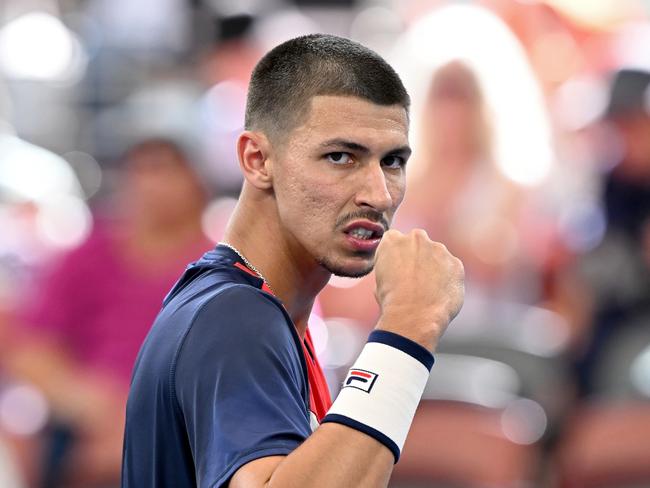 BRISBANE, AUSTRALIA - JANUARY 03: Alexei Popyrin of Australia celebrates after winning a point in his match against Roman Safiullin of Russia during day four of the 2024 Brisbane International at Queensland Tennis Centre on January 03, 2024 in Brisbane, Australia. (Photo by Bradley Kanaris/Getty Images)