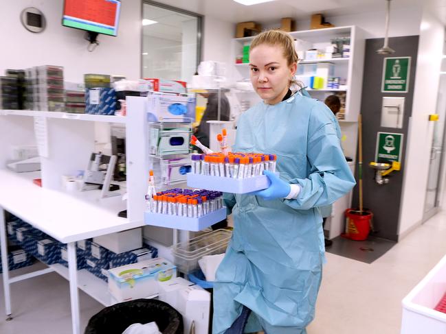 Principal scientist Katrina Collins with COVID-19 test samples, inside a respiratory lab at Sullivan Nicolaides Pathology, Bowen Hills. Picture: NCA NewsWire/Richard Gosling