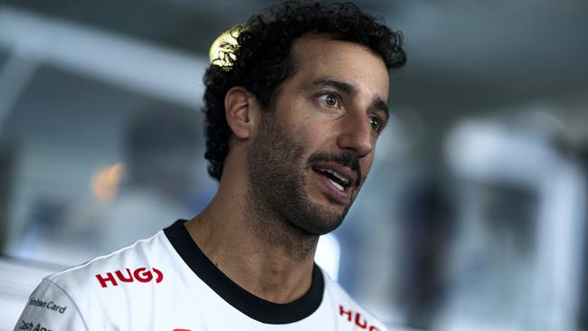 SINGAPORE, SINGAPORE - SEPTEMBER 19: Daniel Ricciardo of Australia and Visa Cash App RB looks on in the Paddock during previews ahead of the F1 Grand Prix of Singapore at Marina Bay Street Circuit on September 19, 2024 in Singapore, Singapore. (Photo by Rudy Carezzevoli/Getty Images)