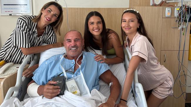 David Liddiard in hospital on the Gold Coast, surrounded by his with wife Peta (left) and daughters Kaiya and Sienna (far right). Picture: Supplied